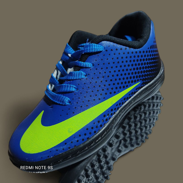 کفش ورزشی فوتبال چمن مصنوعی پسرانه نایک مرکوریال